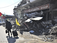 Following the ceasefire agreement between Israel and Lebanon, residents of the southern Lebanese city of Nabatieh return to their homes on N...