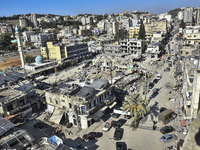 Following the ceasefire agreement between Israel and Lebanon, residents of the southern Lebanese city of Nabatieh return to their homes on N...