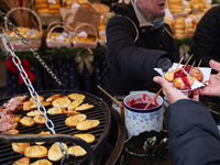 Traditional 'Oscypek' cheese, a smoked cheese made of salted sheep milk exclusively in the Tatra Mountains region, is sold at Christmas mark...