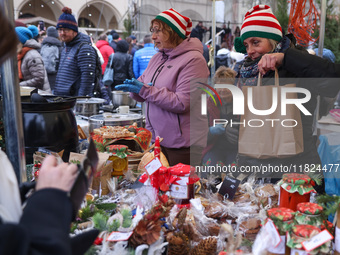 Traditional regional products are sold at Christmas market at the Main Square in Krakow, Poland on Nobember 30th, 2024.  (