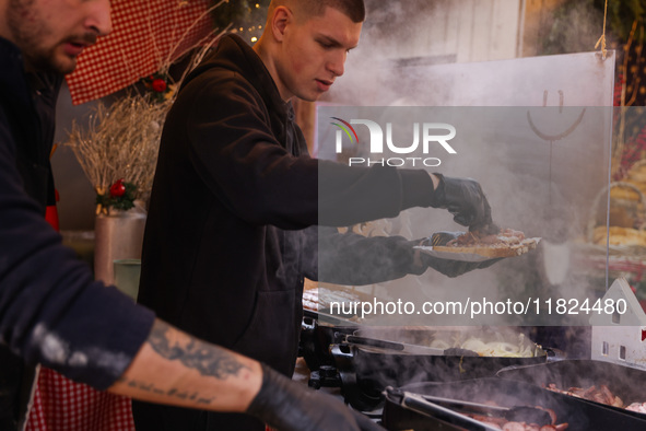 Traditional loaves of bread with lard and topping at Christmas market at the Main Square in Krakow, Poland on Nobember 30th, 2024.  