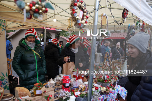 Traditional regional products are sold at Christmas market at the Main Square in Krakow, Poland on Nobember 30th, 2024.  