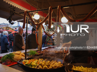 Traditional Polish food is sold at Christmas market at the Main Square in Krakow, Poland on Nobember 30th, 2024.  (