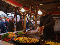 Traditional Polish food is sold at Christmas market at the Main Square in Krakow, Poland on Nobember 30th, 2024.  (