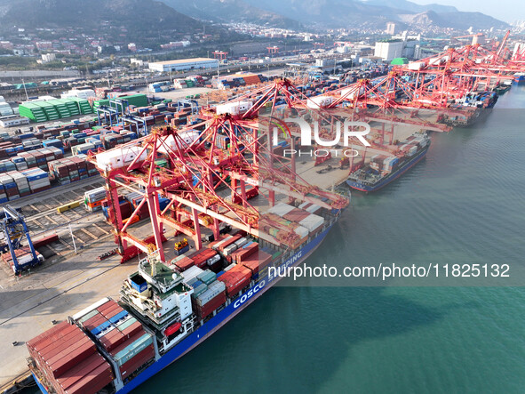 Cargo ships dock to load and unload containers at a container terminal in Lianyungang Port in Lianyungang, China, on December 1, 2024. 