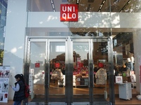 A citizen passes a UNIQLO store in Hangzhou, China, on December 1, 2024. (