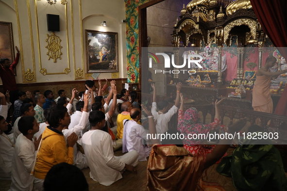 Monks and devotees of ISKCON in Kolkata, India, hold a prayer protest against the recent arrest of ISKCON Bangladesh priest Chinmoy Krishna...