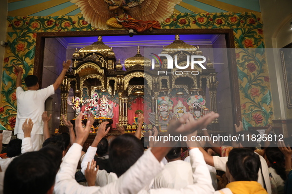 Monks and devotees of ISKCON in Kolkata, India, hold a prayer protest against the recent arrest of ISKCON Bangladesh priest Chinmoy Krishna...