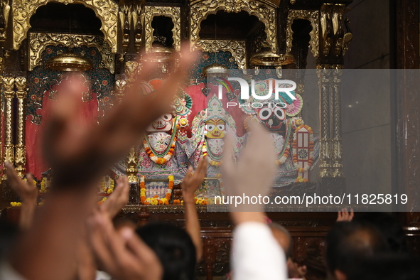 Monks and devotees of ISKCON in Kolkata, India, hold a prayer protest against the recent arrest of ISKCON Bangladesh priest Chinmoy Krishna...