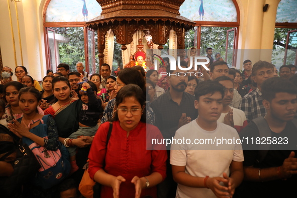 Monks and devotees of ISKCON in Kolkata, India, hold a prayer protest against the recent arrest of ISKCON Bangladesh priest Chinmoy Krishna...