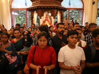 Monks and devotees of ISKCON in Kolkata, India, hold a prayer protest against the recent arrest of ISKCON Bangladesh priest Chinmoy Krishna...