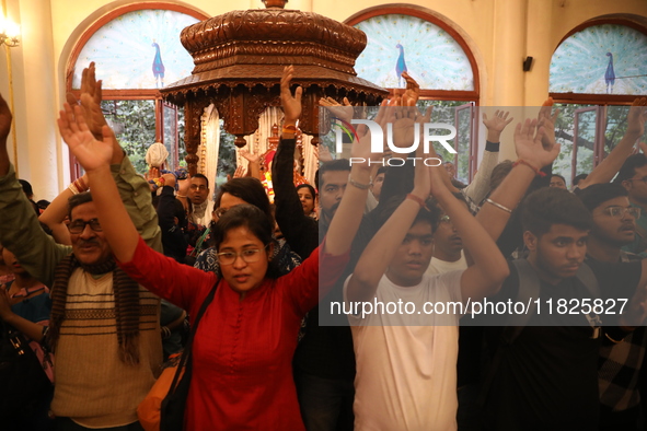 Monks and devotees of ISKCON in Kolkata, India, hold a prayer protest against the recent arrest of ISKCON Bangladesh priest Chinmoy Krishna...