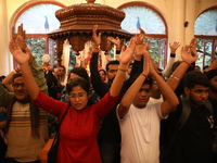 Monks and devotees of ISKCON in Kolkata, India, hold a prayer protest against the recent arrest of ISKCON Bangladesh priest Chinmoy Krishna...