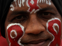 Social Activists Are Seen On Wayside They Are Performing Awareness Program On The Observation Of World AIDs Day In The Eastern Indian State...