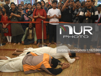 Iskcon members pray to protest against atrocities on Hindus in Bangladesh in Kolkata, India, on December 1, 2024. (