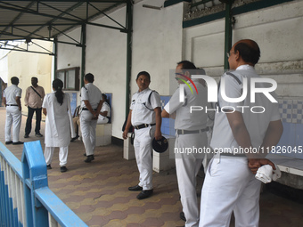 Kolkata Police officers stand beside the Bangladesh High Commissioner's office in Kolkata, India, on December 1, 2024. Security is imposed i...