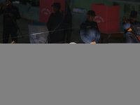 A Nepali voter casts a vote in the local by-election at a polling center in Kathmandu, Nepal, on December 1, 2024. A periodic election to el...