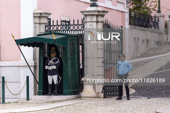 In Lisbon, Portugal, on December 1, 2024, official guards stand in front of the presidential palace. Lisbon, the capital of Portugal, is one...