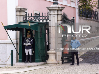 In Lisbon, Portugal, on December 1, 2024, official guards stand in front of the presidential palace. Lisbon, the capital of Portugal, is one...