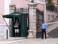 In Lisbon, Portugal, on December 1, 2024, official guards stand in front of the presidential palace. Lisbon, the capital of Portugal, is one...