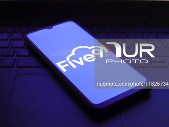 The Five9 Inc. logo appears on the screen of a smartphone in Reno, United States, on December 1, 2024. (