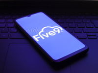 The Five9 Inc. logo appears on the screen of a smartphone in Reno, United States, on December 1, 2024. (