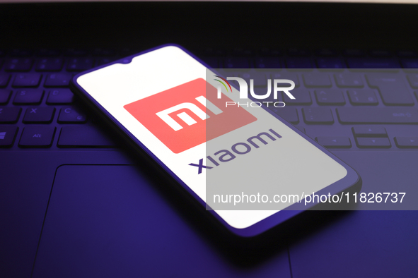 The Xiaomi Inc. logo appears on the screen of a smartphone in Reno, United States, on December 1, 2024. 