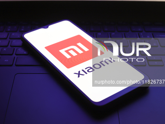 The Xiaomi Inc. logo appears on the screen of a smartphone in Reno, United States, on December 1, 2024. (