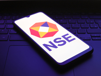 The National Stock Exchange of India (NSE) logo appears on the screen of a smartphone in Reno, United States, on December 1, 2024. (