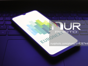 The Euronext logo appears on the screen of a smartphone in Reno, United States, on December 1, 2024. (