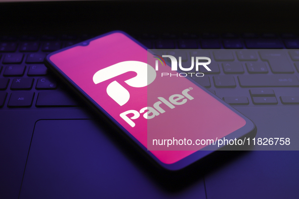 The Parler logo appears on the screen of a smartphone in Reno, United States, on December 1, 2024. 