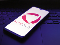 The FireEye, Inc. logo appears on the screen of a smartphone in Reno, United States, on December 1, 2024 (