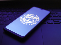 The International Monetary Fund (IMF) logo appears on the screen of a smartphone in Reno, United States, on December 1, 2024. (