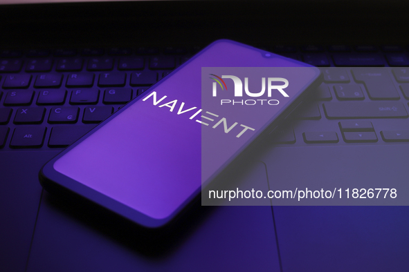 The Navient logo appears on the screen of a smartphone in Reno, United States, on December 1, 2024. 