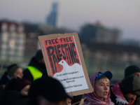 More than a hundred pro-Palestinian protesters take part in a demonstration against the German government's supply of arms to Israel in Colo...