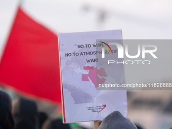 More than a hundred pro-Palestinian protesters take part in a demonstration against the German government's supply of arms to Israel in Colo...