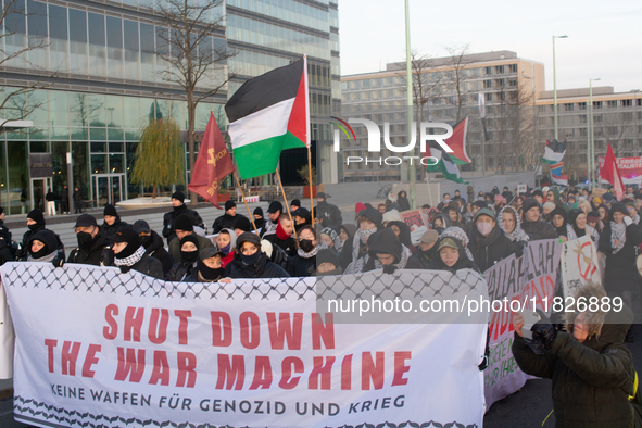 More than a hundred pro-Palestinian protesters take part in a demonstration against the German government's supply of arms to Israel in Colo...