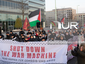 More than a hundred pro-Palestinian protesters take part in a demonstration against the German government's supply of arms to Israel in Colo...