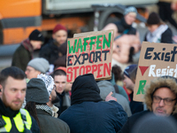 More than a hundred pro-Palestinian protesters take part in a demonstration against the German government's supply of arms to Israel in Colo...