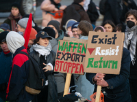 More than a hundred pro-Palestinian protesters take part in a demonstration against the German government's supply of arms to Israel in Colo...