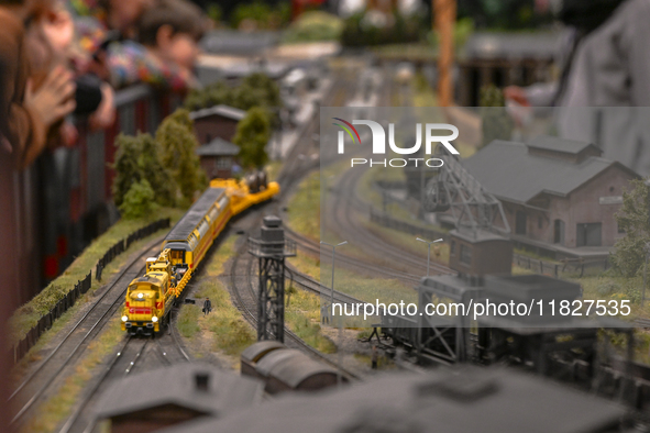 KRAKOW, POLAND - DECEMBER 01: 
Train enthusiasts and hobbyists gather at the Nowa Huta Cultural Center, where a 700 m2 space becomes a capti...