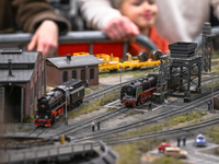 KRAKOW, POLAND - DECEMBER 01: 
Train enthusiasts and hobbyists gather at the Nowa Huta Cultural Center, where a 700 m2 space becomes a capti...