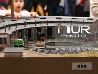 KRAKOW, POLAND - DECEMBER 01: 
Train enthusiasts and hobbyists gather at the Nowa Huta Cultural Center, where a 700 m2 space becomes a capti...