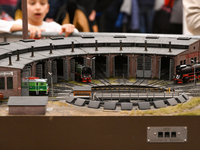 KRAKOW, POLAND - DECEMBER 01: 
Train enthusiasts and hobbyists gather at the Nowa Huta Cultural Center, where a 700 m2 space becomes a capti...