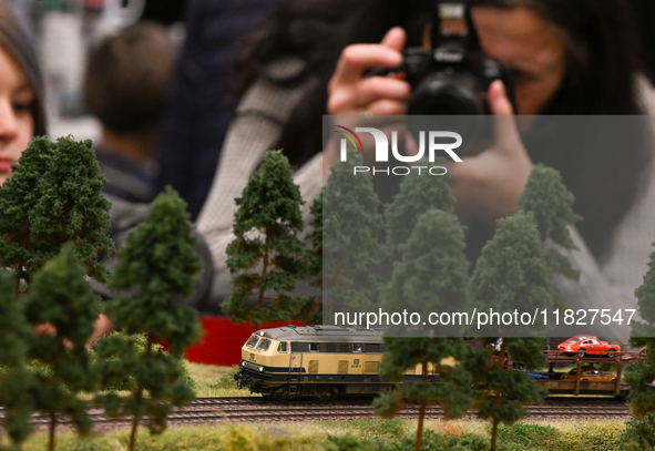 KRAKOW, POLAND - DECEMBER 01: 
A view of the diesel locomotive DB Class 216 as thousands of train enthusiasts and hobbyists gather at the No...