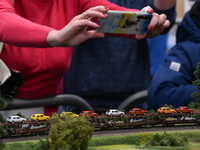 KRAKOW, POLAND - DECEMBER 01: 
Train enthusiasts and hobbyists gather at the Nowa Huta Cultural Center, where a 700 m2 space becomes a capti...