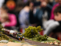 KRAKOW, POLAND - DECEMBER 01: 
Train enthusiasts and hobbyists gather at the Nowa Huta Cultural Center, where a 700 m2 space becomes a capti...