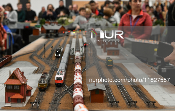 KRAKOW, POLAND - DECEMBER 01: 
Train enthusiasts and hobbyists gather at the Nowa Huta Cultural Center, where a 700 m2 space becomes a capti...