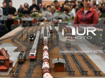 KRAKOW, POLAND - DECEMBER 01: 
Train enthusiasts and hobbyists gather at the Nowa Huta Cultural Center, where a 700 m2 space becomes a capti...