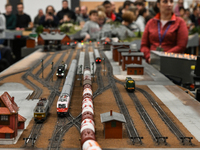 KRAKOW, POLAND - DECEMBER 01: 
Train enthusiasts and hobbyists gather at the Nowa Huta Cultural Center, where a 700 m2 space becomes a capti...